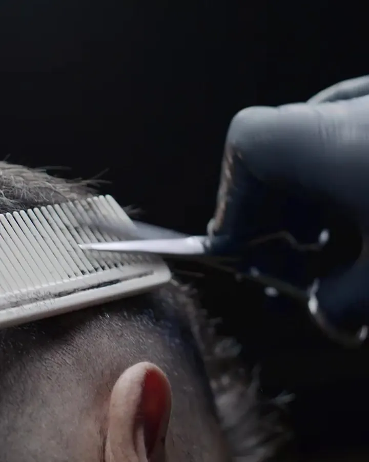 Scissor-over-comb men's haircut